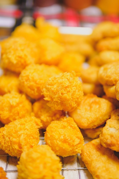 Crispy breaded mozzarella cheese cheese ball blurred background