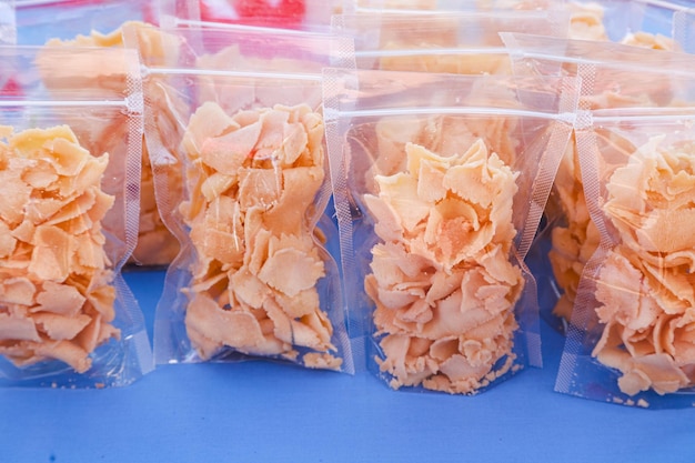 Photo crispy cheese chips are served in pouches for sale