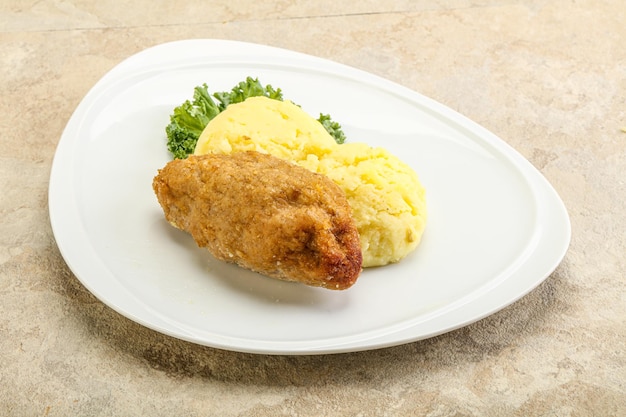 Crispy chicken cutlet from minced meat with mashed potato