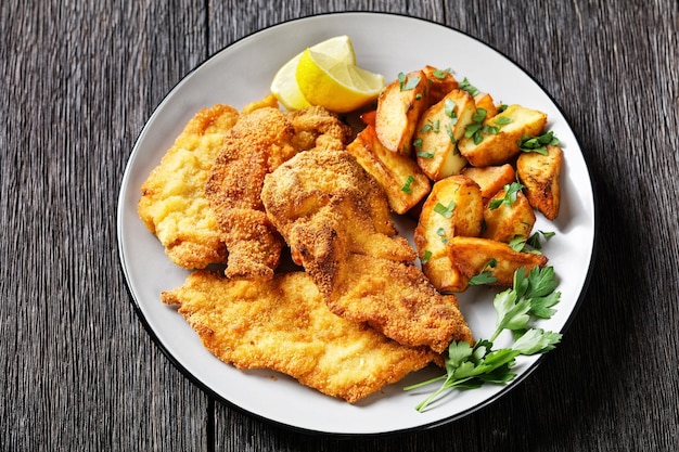 Crispy Chicken Cutlets with spicy roasted potatoes