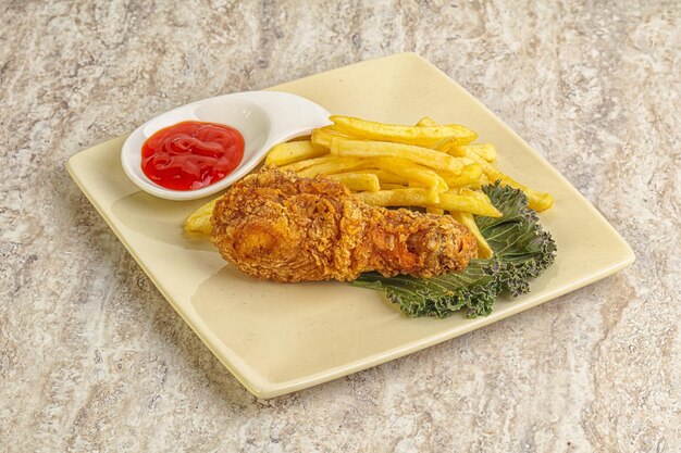 Crispy chicken leg with fry potato