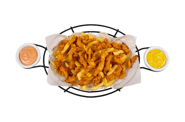 Crispy chicken pieces with cajun spice on french fries accompanied by cocktail sauce