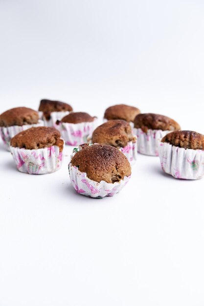 Crispy chocolate muffin isolated on a white background