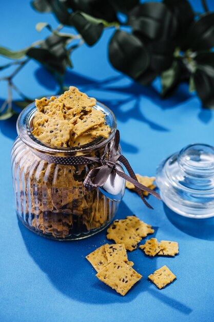 Crispy cookies with sesame seeds in a glass