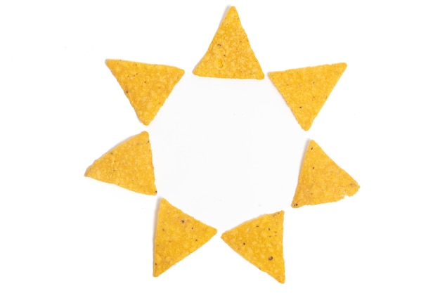 Crispy corn tortilla nachos chips photo concept of star circle formation isolated