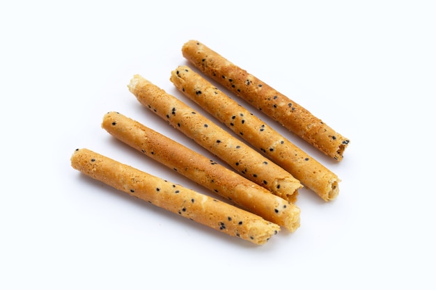 Crispy egg rolls on white background.