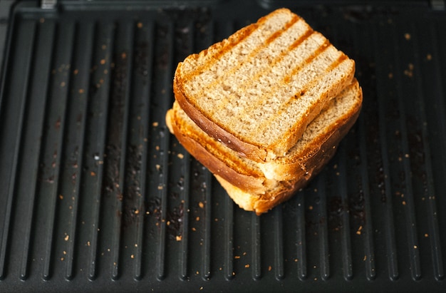 Crispy fried bread on a hot grill.