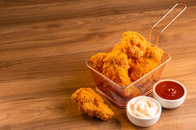 Crispy fried chicken in the basket.