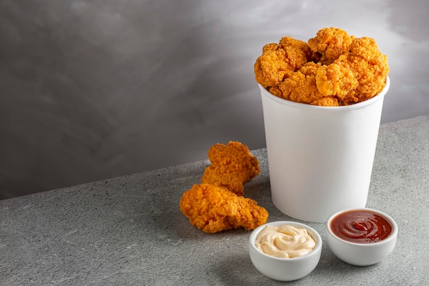 Crispy fried chicken in the bucket Chicken bucket