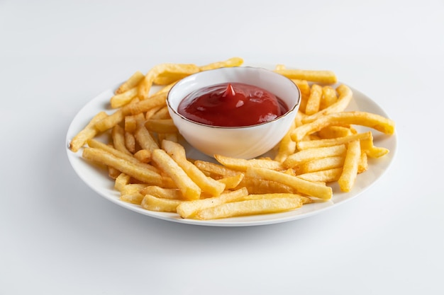 Crispy fries in a plate on a white background Hot american fast food