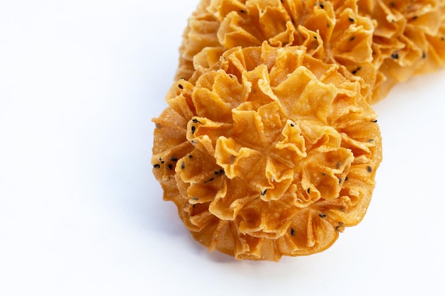 Crispy lotus blossom cookie in white background