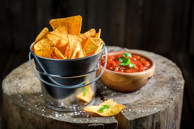 Crispy nachos with red pepper dip and salt