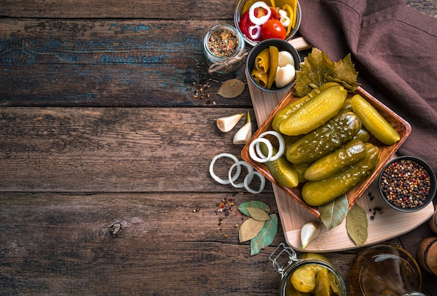 Crispy pickled cucumbers on a wooden table