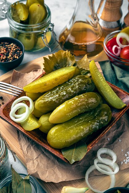 Crispy pickled cucumbers on a wooden table