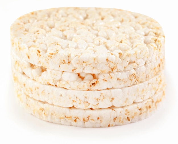 Crispy popped corn cookies over white background