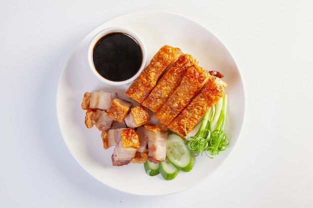 Photo crispy pork belly or pork cutlet with sweet and sour sauce