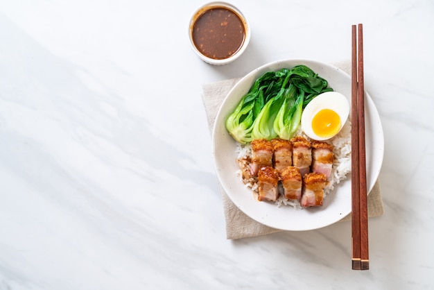 crispy pork belly on topped rice