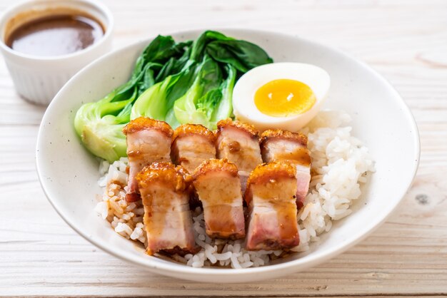 crispy pork belly on topped rice