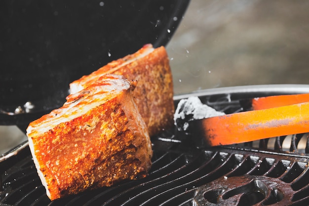 Crispy pork on grill