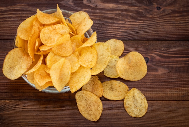 Crispy potato chips in bowl