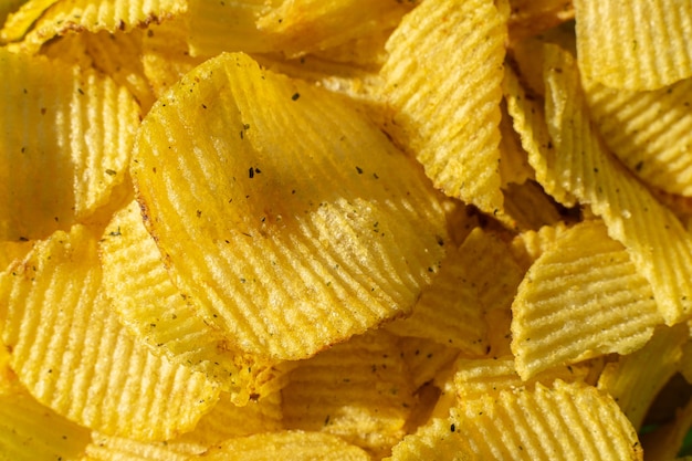 Crispy potato chips close-up