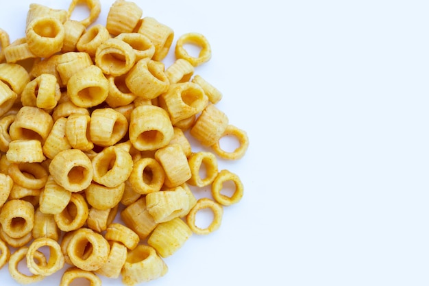 Crispy potato rings on white background