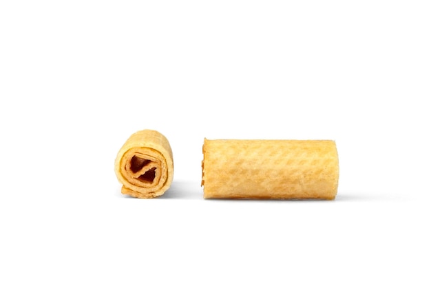 Photo crispy wafer rolls isolated on white background.