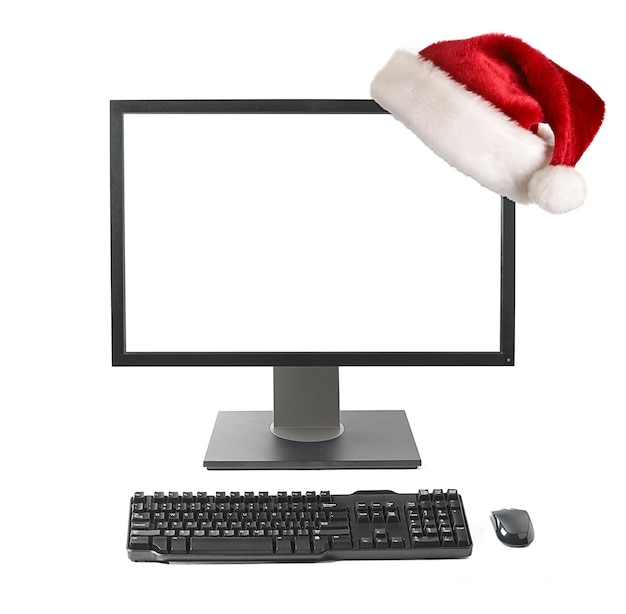 Cristmas 온라인 쇼핑 개념 산타 h와 컴퓨터 모니터