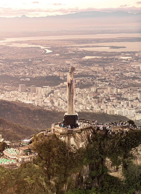 Cristo Redentor statue in Rio de Janeiro aerial shot during a spectacular sunset