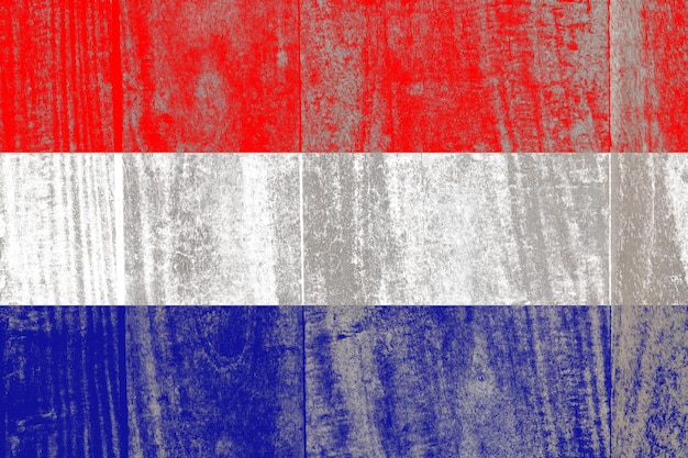 Croatia flag painted on a damaged old wooden background