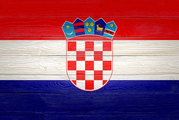 Croatia flag painted on old wood plank background