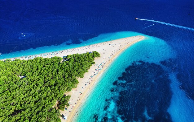 Croatia Hvar island Bol Panoramic aerial view at the Zlatni Rat Beach and sea from air Famous place in Croatia Summer seascape from drone Travel image