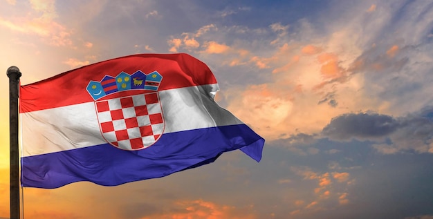 The croatia waving flag and sky background.