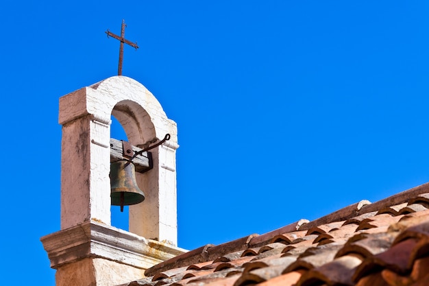 Croatian Church Roof on bright blue sky background