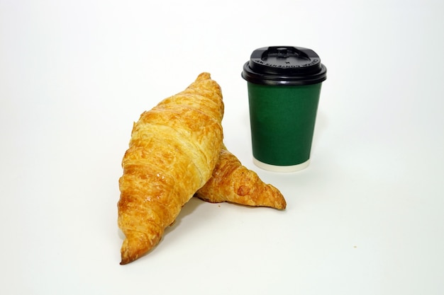 Croissant and coffee to go