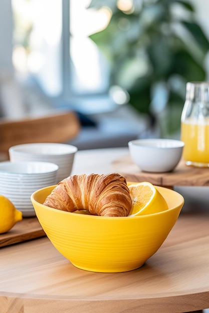 croissant and coffee on kitchen countertop against blurred minimalist interior with modern furniture