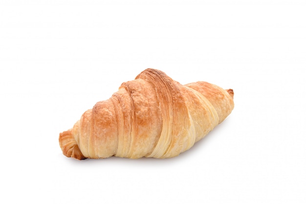 Foto croissant die op een wit wordt geïsoleerd