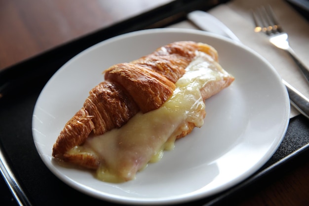 Croissant Ham cheese on wood