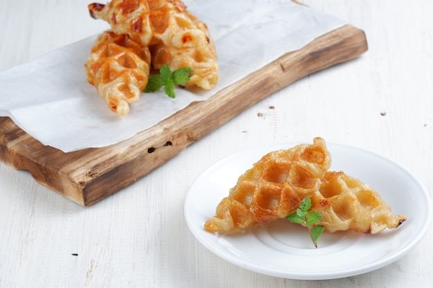 croissant waffle or croffle on white background