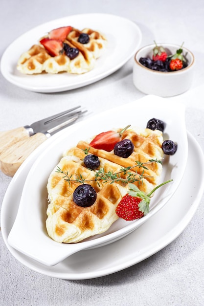 Croissant Waffle or Croffle with greentea sauce and chopped almond easy making for breakfast