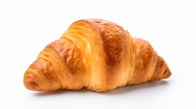 a croissant on a white surface