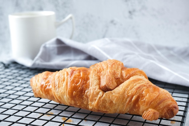 Croissant with a cup of coffee