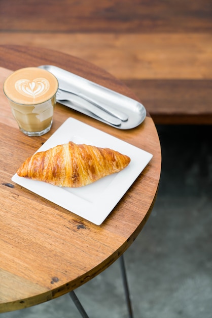 croissant with hot coffee