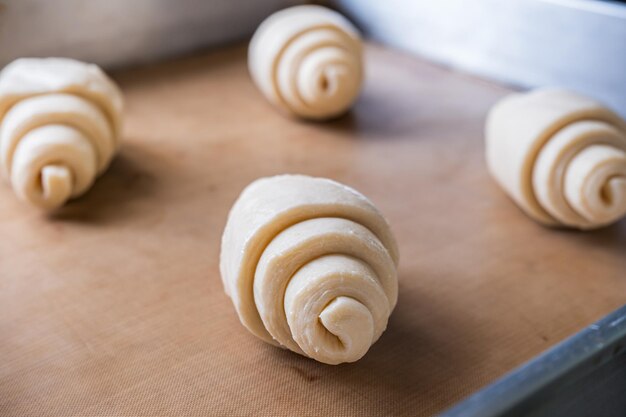 Croissants on baking rack