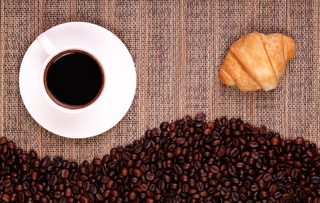 Croissants coffee and beans 