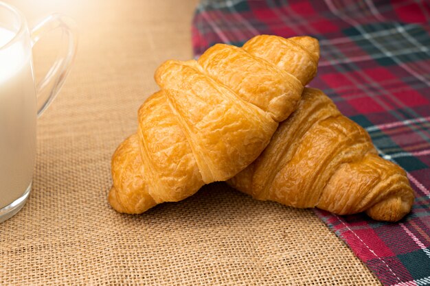 Croissants and milk on table.  Food for breakfast concept