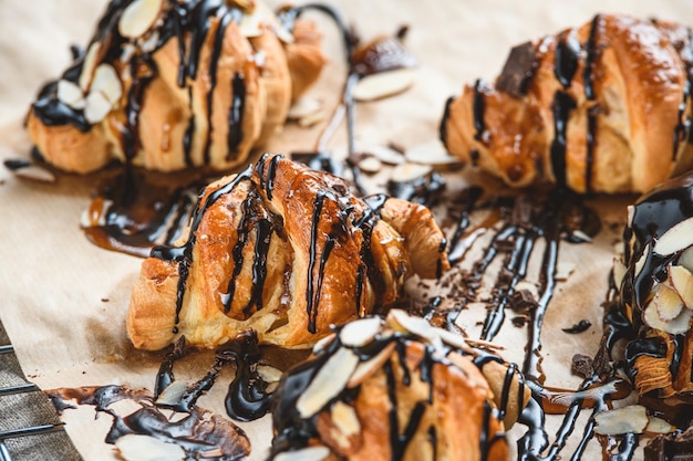 Croissants with chocolate and honey on the table with.