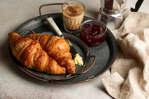 Croissants with coffee and jam