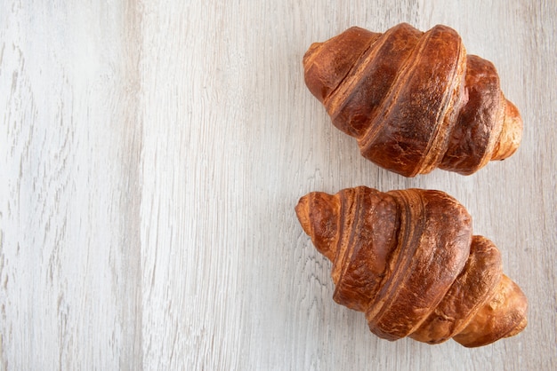 Croissants on a wooden table