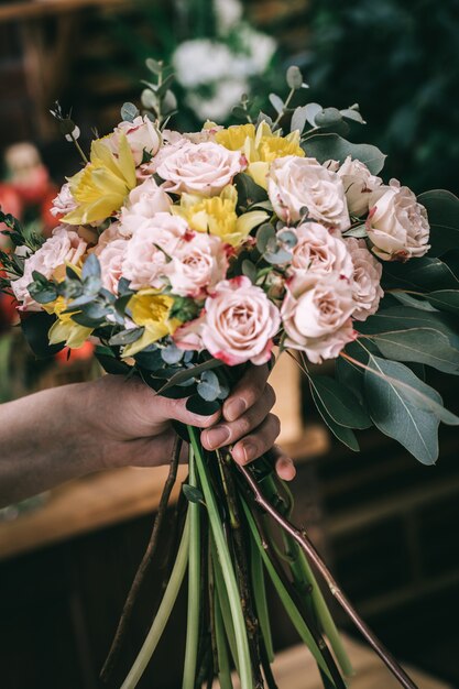 Crop florist showing beautiful composition